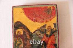 Fragment of an ancient icon. Miniature on wood. 19th century. Russia