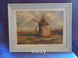 OIL PAINTING ON WOOD LANDSCAPE WITH WINDMILL signed around 1940