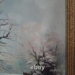 Oil on canvas signed Winter landscape under snowy river edge woods