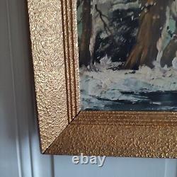 Oil on canvas signed Winter landscape under snowy river edge woods