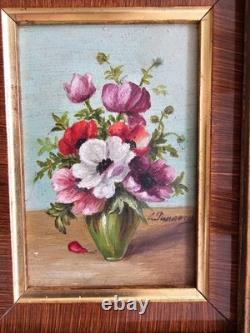 Oil on wood panel painting, bouquet of polychrome flowers, signed in a molded frame