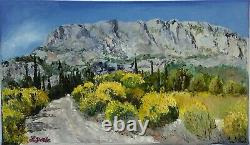 Oil painting on canvas with knife, wooden frame, broom on Mount Sainte-Victoire