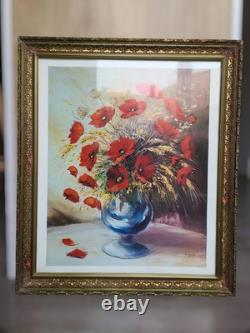 Old carved wooden frame with a reproduction of an oil on canvas signed