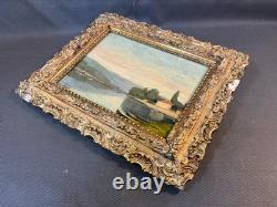 Old framed wooden oil painting on panel, signed, river scene