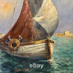 Old large oil painting on wood of a fishing boat in the Mediterranean coast