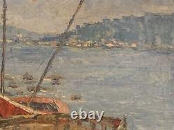 Old oil painting of a seascape with stranded boats impressionism signed Alvarez
