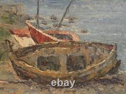 Old oil painting of a seascape with stranded boats impressionism signed Alvarez