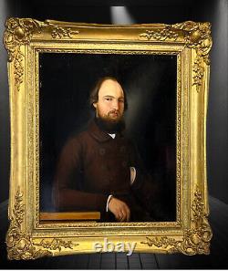 PAINTING / OIL ON WOOD FROM THE 19TH CENTURY PORTRAIT OF A WELL-FRAMED MAN