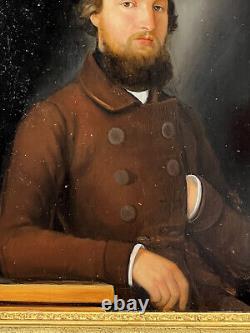 PAINTING / OIL ON WOOD FROM THE 19TH CENTURY PORTRAIT OF A WELL-FRAMED MAN