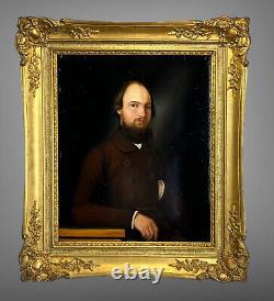 PAINTING / OIL ON WOOD FROM THE 19TH CENTURY PORTRAIT OF A WELL-FRAMED MAN