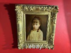 Portrait of a little girl signed and dated 1884, very beautiful gilded wooden frame