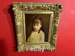 Portrait of a little girl signed and dated 1884, very beautiful gilded wooden frame