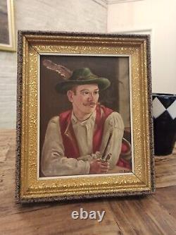 Signed oil on wood painting: Tyrolean Man Smoking Pipe, circa 1950, with a golden frame.