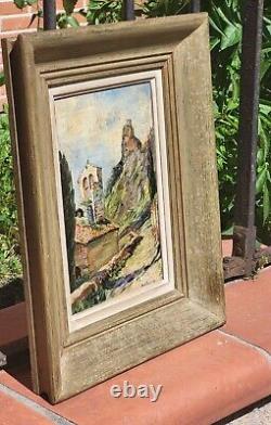 Signed titled painting. Church view. Oil on wood panel.