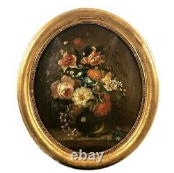 XIXth Century School, Bouquet of Flowers. Oil on canvas, oval wooden frame with gilded stucco.