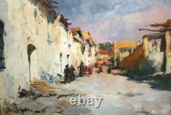 Belle peinture sur panneau dans cadre en bois sculpté signée R. Giardi, 1900
