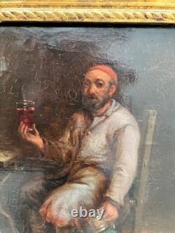 Huile/panneau de chêne Le buveur, suiveur de TENIERS Ecole flamande du XVIIe