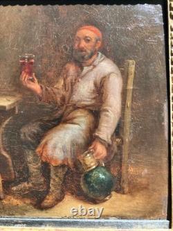 Huile/panneau de chêne Le buveur, suiveur de TENIERS Ecole flamande du XVIIe