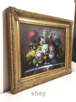 Huile sur toile Signé en bas à droite Cadre en bois doré XXe siècle