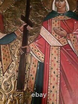 Icone russe ancienne peinture huile sur bois fond et bordures métal doré